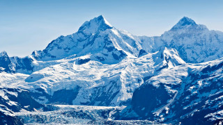 Glacier and snow capped mountains in the Glacier Bay National Park Alaska